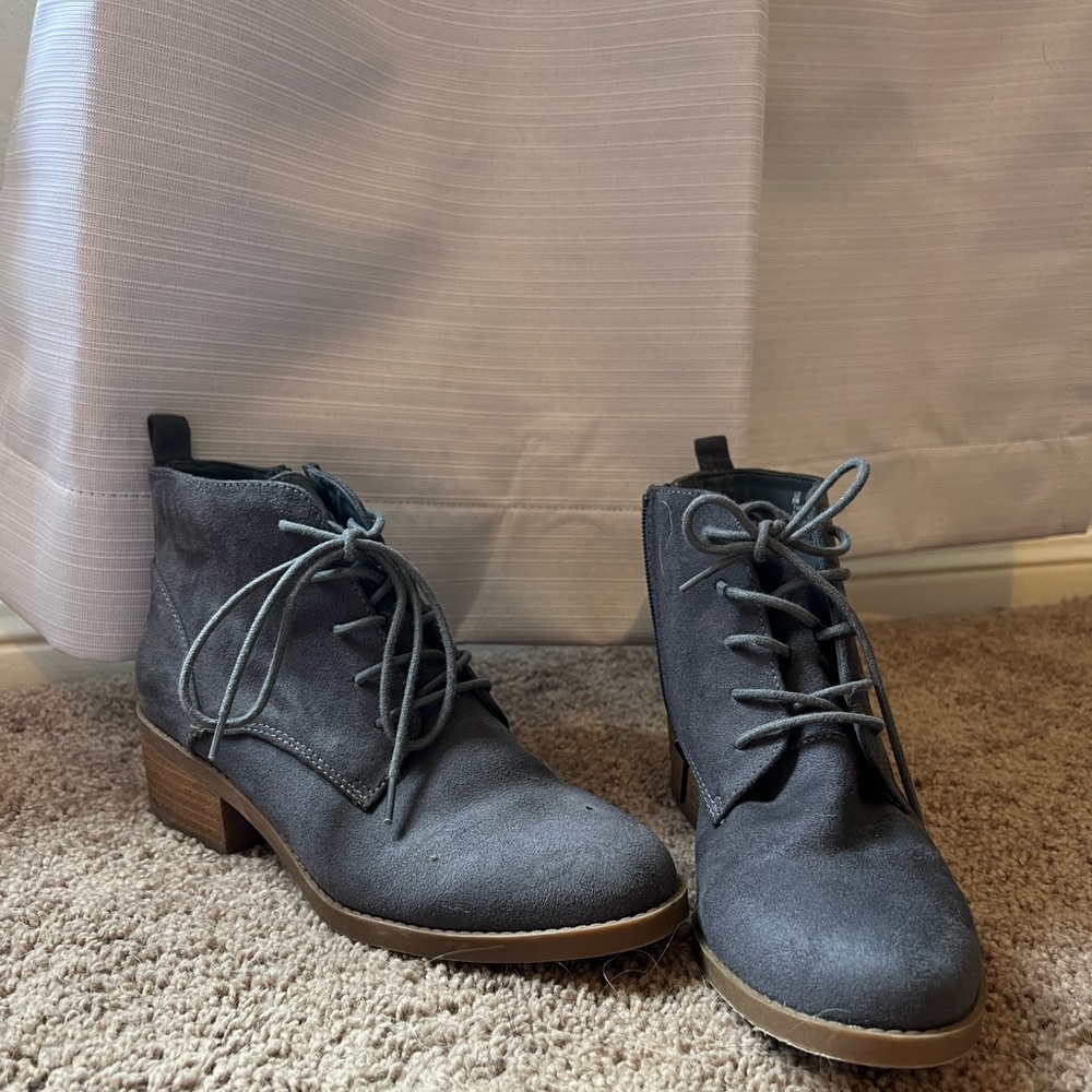Blue ankle boots with brown soles